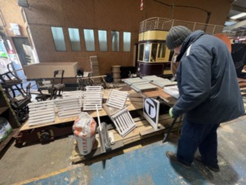 seats being repainted by volunteer Pete Dawes